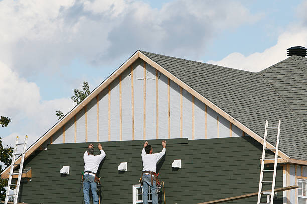 Professional Emergency Siding Repair technician working in Jamestown, KY